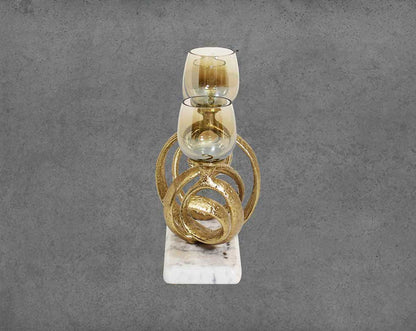 Multi T-light candle holder in gold-finished nickel plated aluminum, smoke luster glass with white marble base.