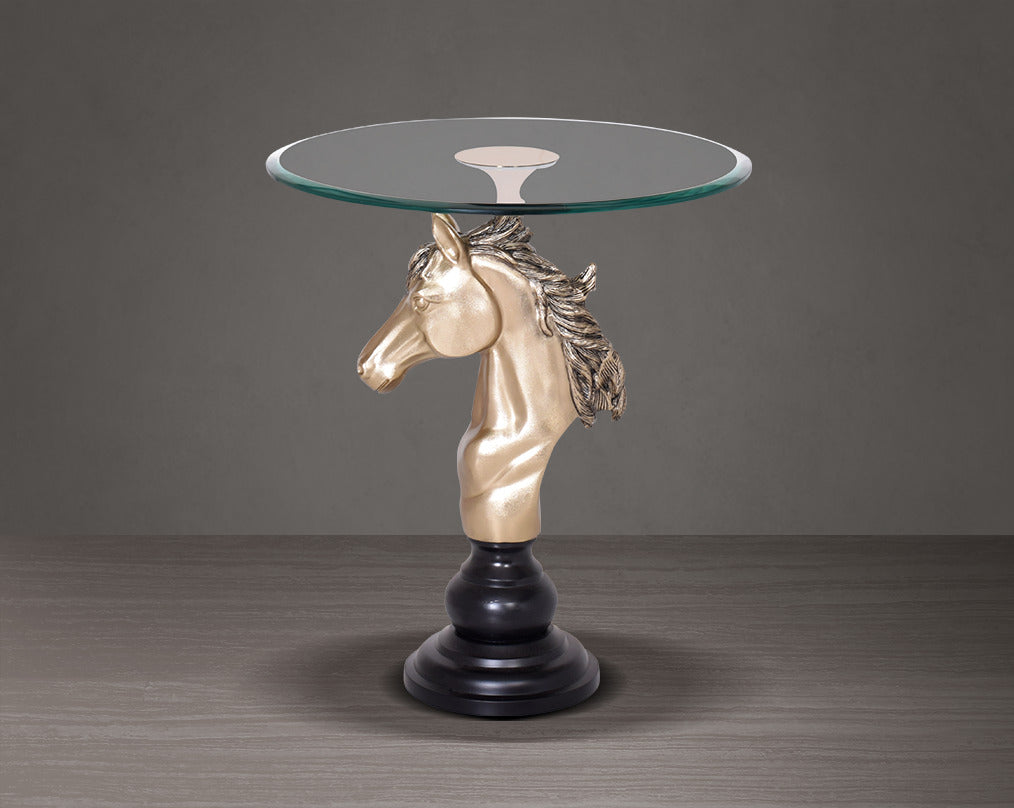 This vintage end table in gold finish aluminium base with horse head design motif with side view