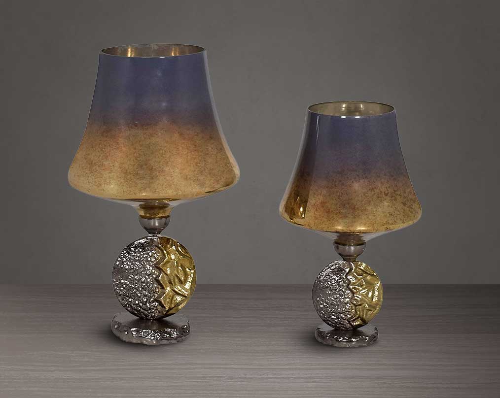 Candle holder in solstice champagne lustre glass and antique nickel-plated textured aluminum decorative base. 1 large 2 small