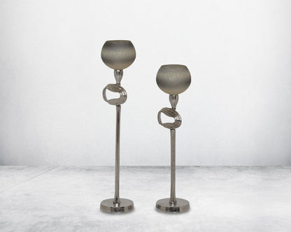 "Pillar goblet candle holder in white & grey luster glass with nickel-plated textured aluminum decorative base. "1 large 2 small