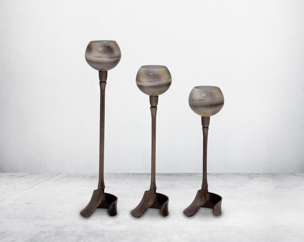 Pillar goblet candle holder in grey color and burnt glaze luster glass with nickel-plated textured aluminum decorative base.