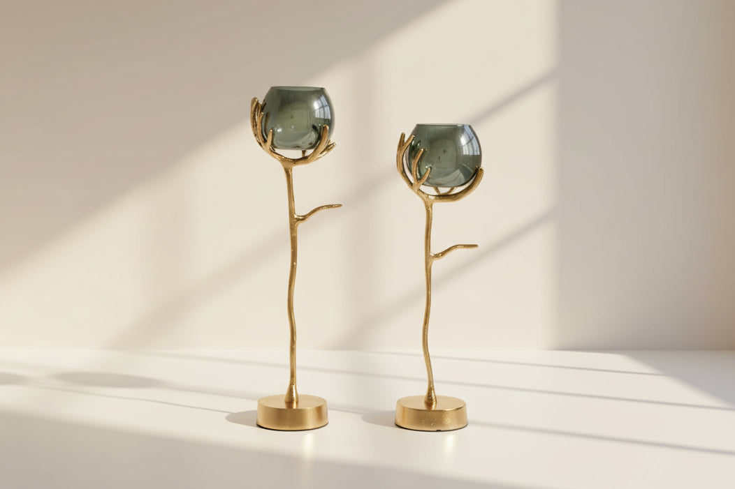 Goblet glass votive t-lite holder in textured moss luster glass with gold finished aluminum decorative base.