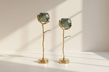 Goblet glass votive t-lite holder in textured moss luster glass with gold finished aluminum decorative base.