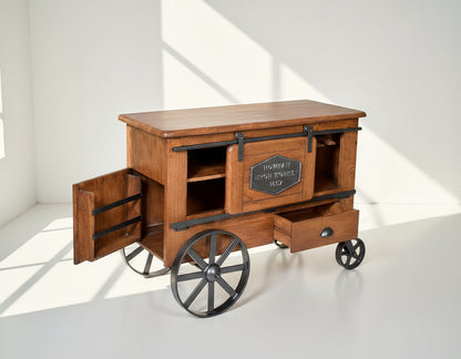 Wine cart/ bar with a vintage look in mango wood open drawer and powder-coated iron wheels with storage.
