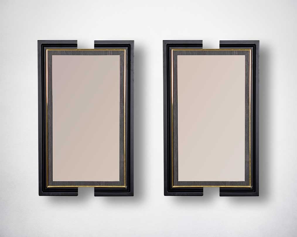 Smoky brown mirrors in dark oak with antique gold design motif.