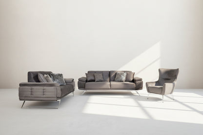 The set comes with 3 cushions to compliment it. Beautifully crafted wing armchair upholstered in fabric with tufted back and high gloss stainless steel legs in modern classic design.