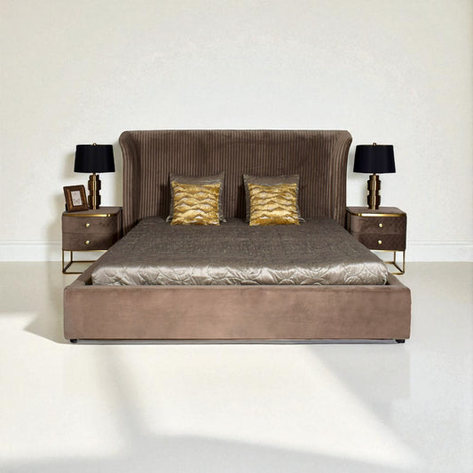 Brown upholstered bed with gold accents in a minimalistic room.