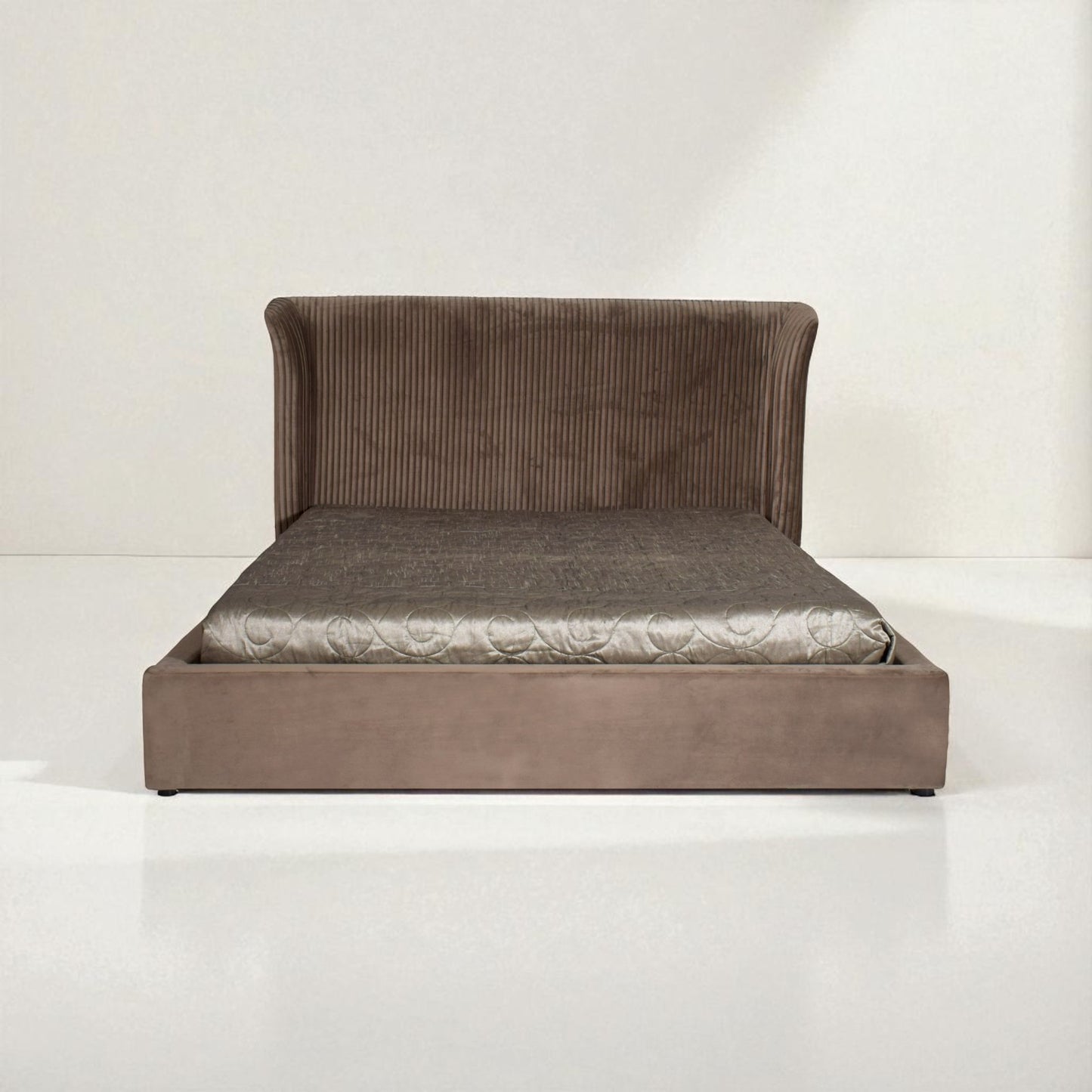 Brown upholstered bed with quilted mattress on a white background