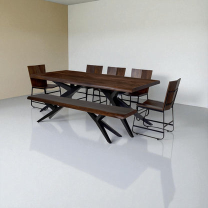 Dining table set with chairs and bench on a reflective surface