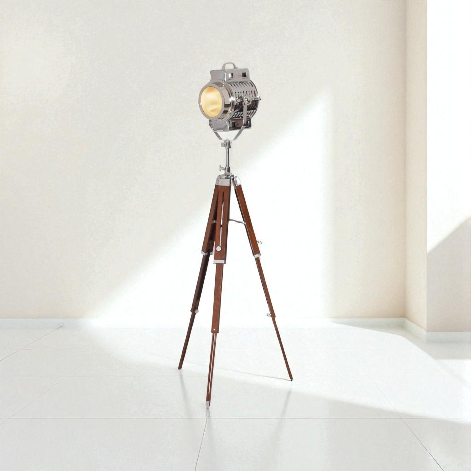 Vintage-style floor lamp with wooden tripod base on a white background
