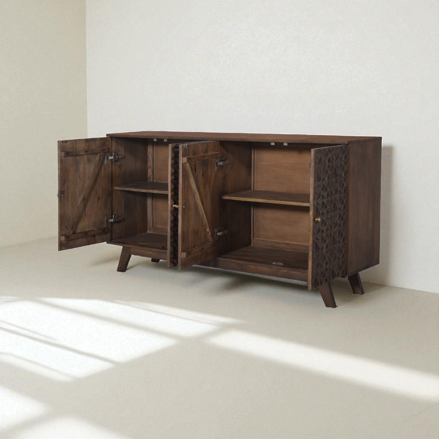 Wooden cabinet with open doors on a light floor and white wall