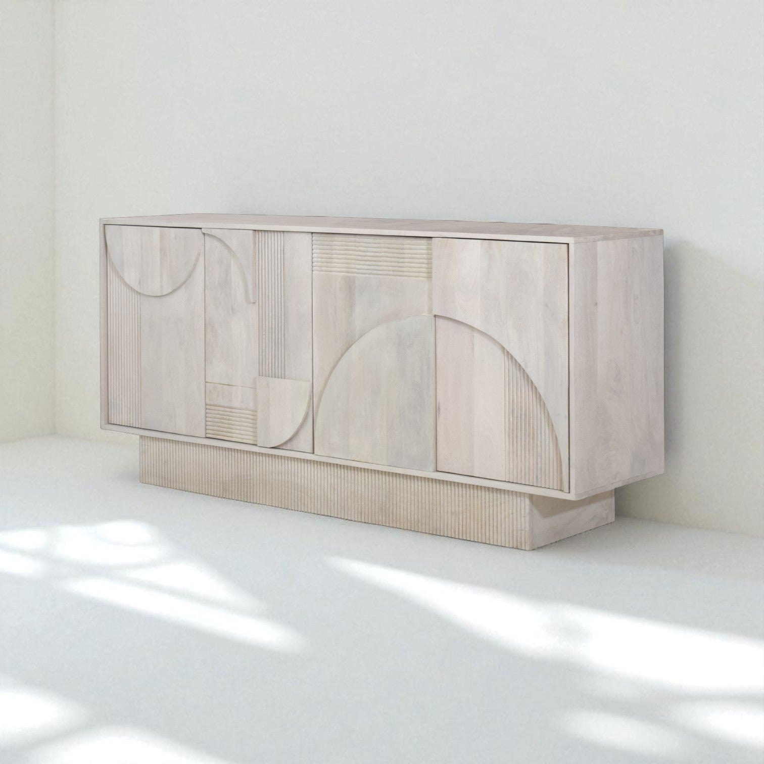 Beige sideboard with decorative items in a room setting