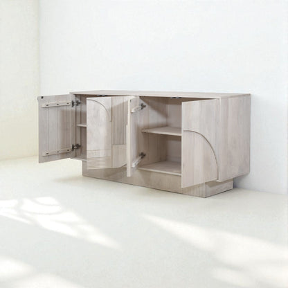 Beige sideboard with decorative items in a room setting