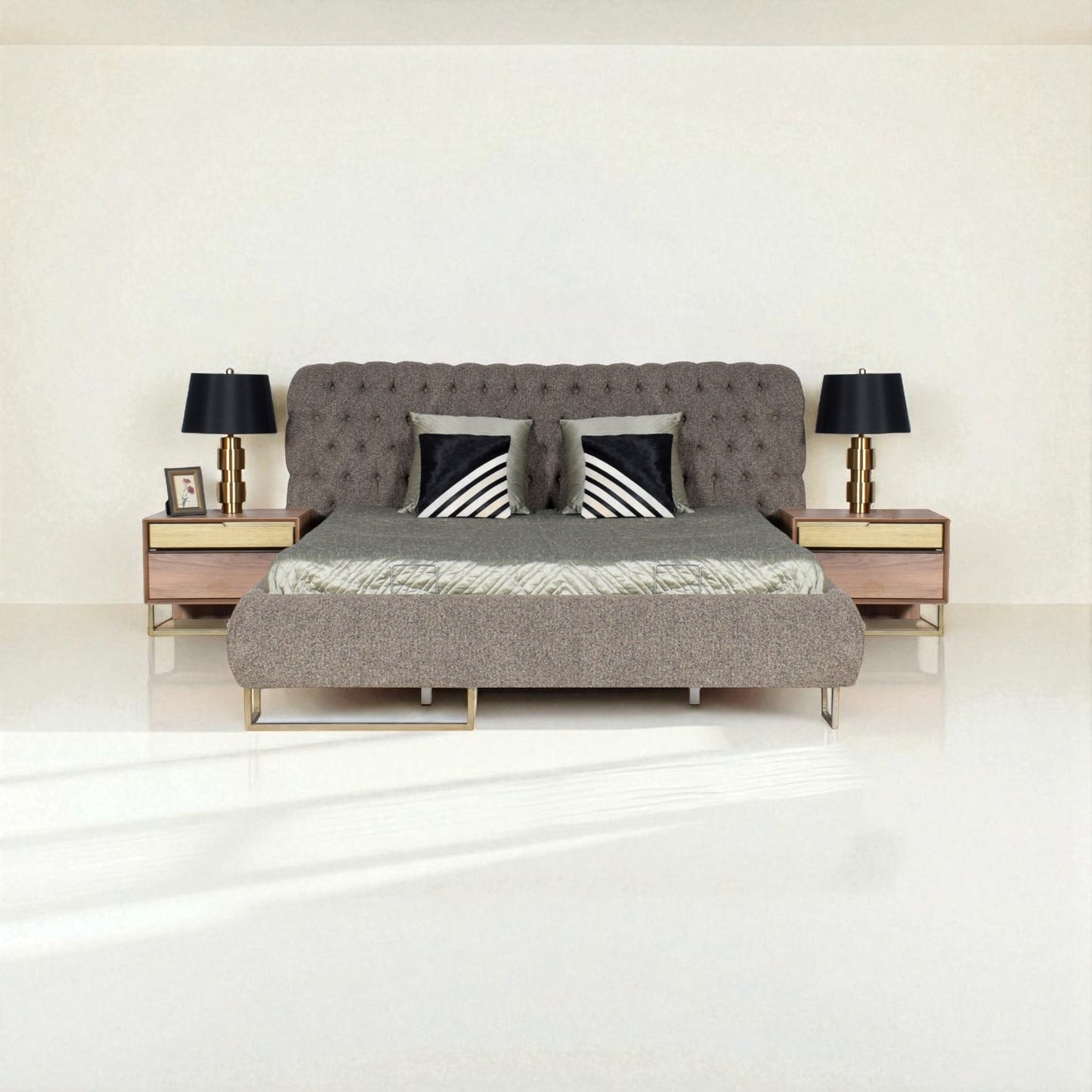 Gray upholstered bed with decorative pillows in a minimalistic bedroom setting.