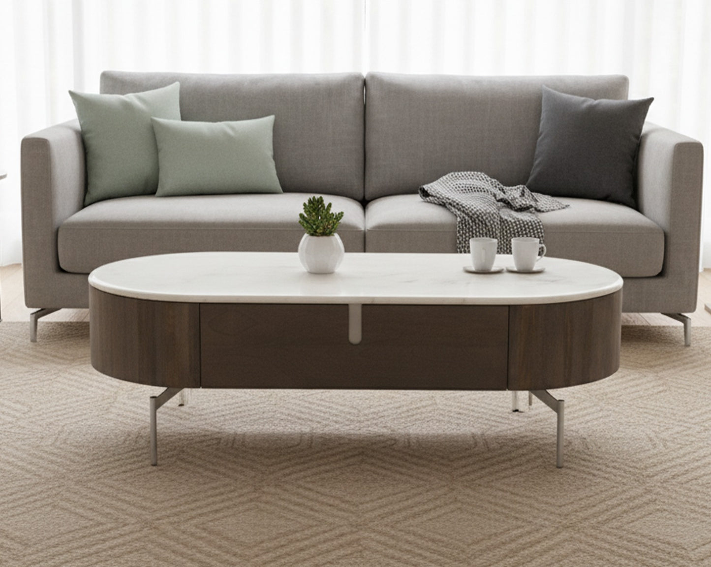 Gray sofa with a round coffee table in a living room setting