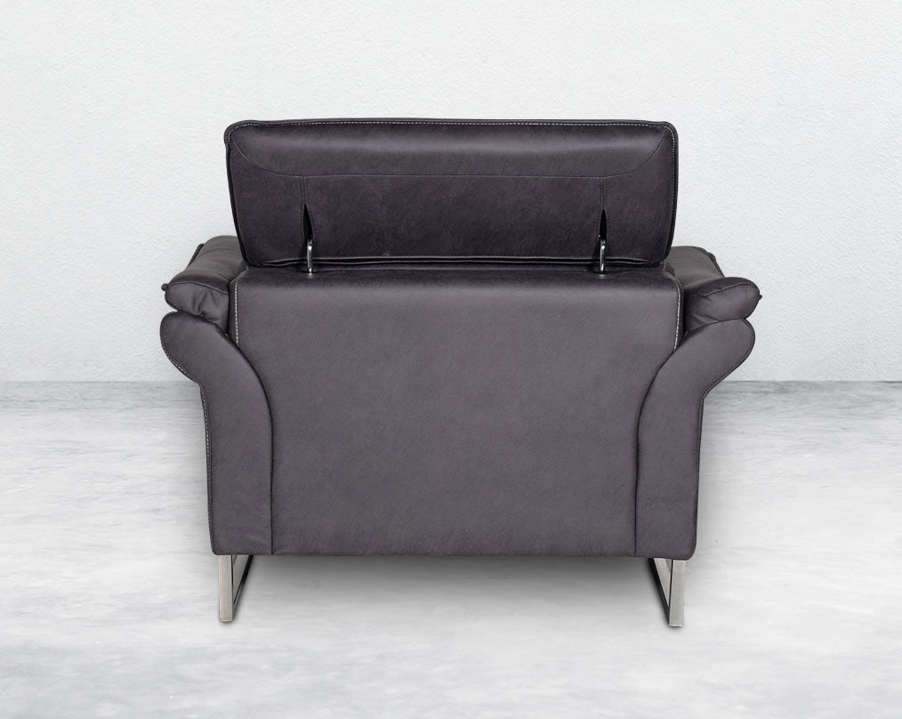 1 seater sofa set upholstered in fabric with adjustable headrest and stainless steel legs in sleek contemporary design.