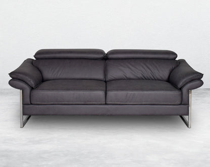3  seater sofa set upholstered in fabric with adjustable headrest and stainless steel legs in sleek contemporary design.