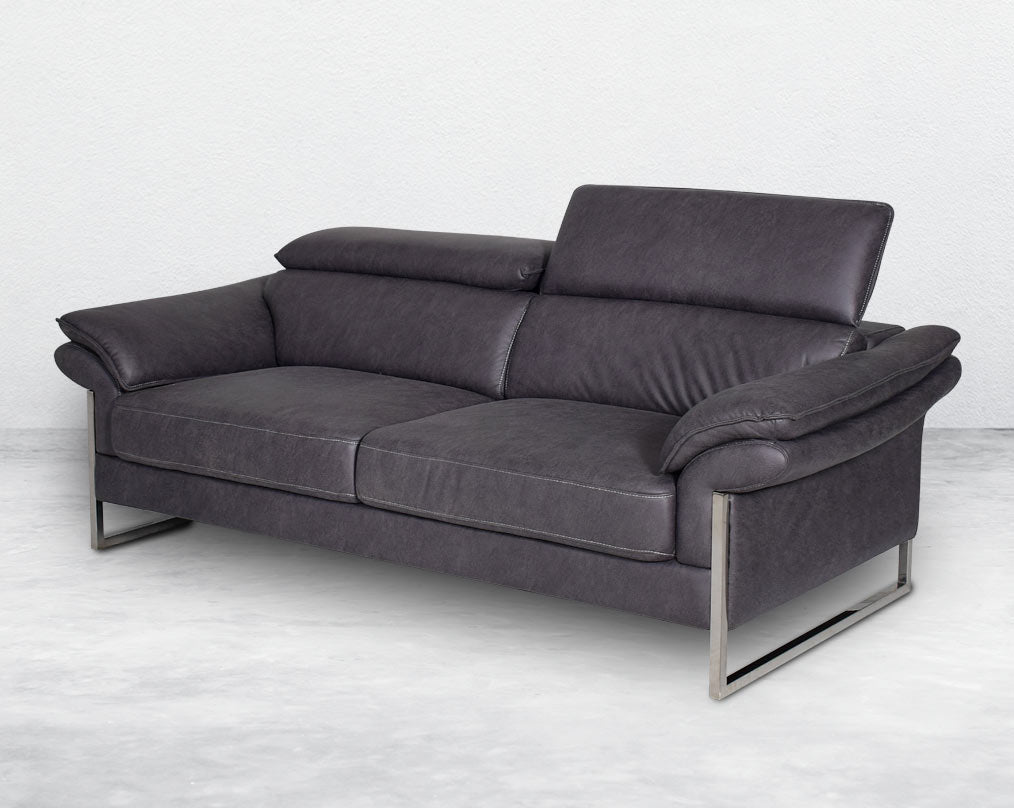 3  seater sofa set upholstered in fabric with adjustable headrest and stainless steel legs in sleek contemporary design.