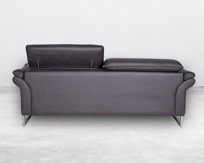 3 seater sofa set upholstered in fabric with adjustable headrest and stainless steel legs in sleek contemporary design.