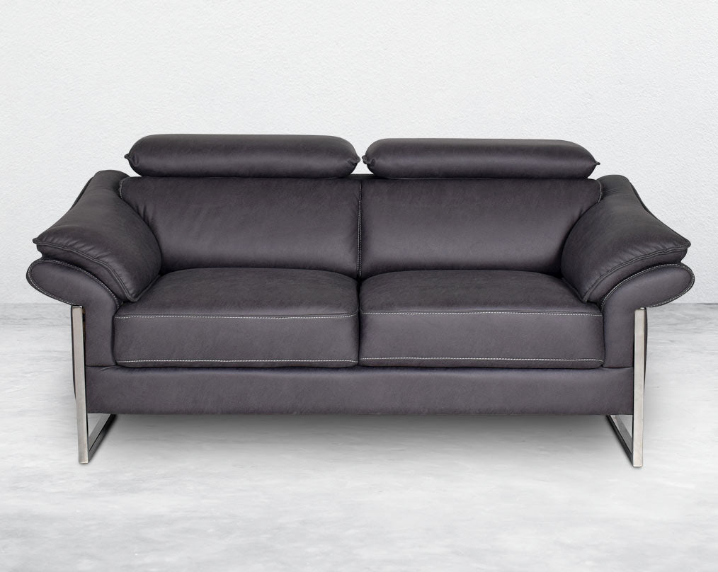 3  seater sofa set upholstered in fabric with adjustable headrest and stainless steel legs in sleek contemporary design.