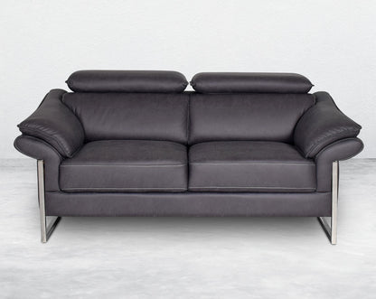 3  seater sofa set upholstered in fabric with adjustable headrest and stainless steel legs in sleek contemporary design.