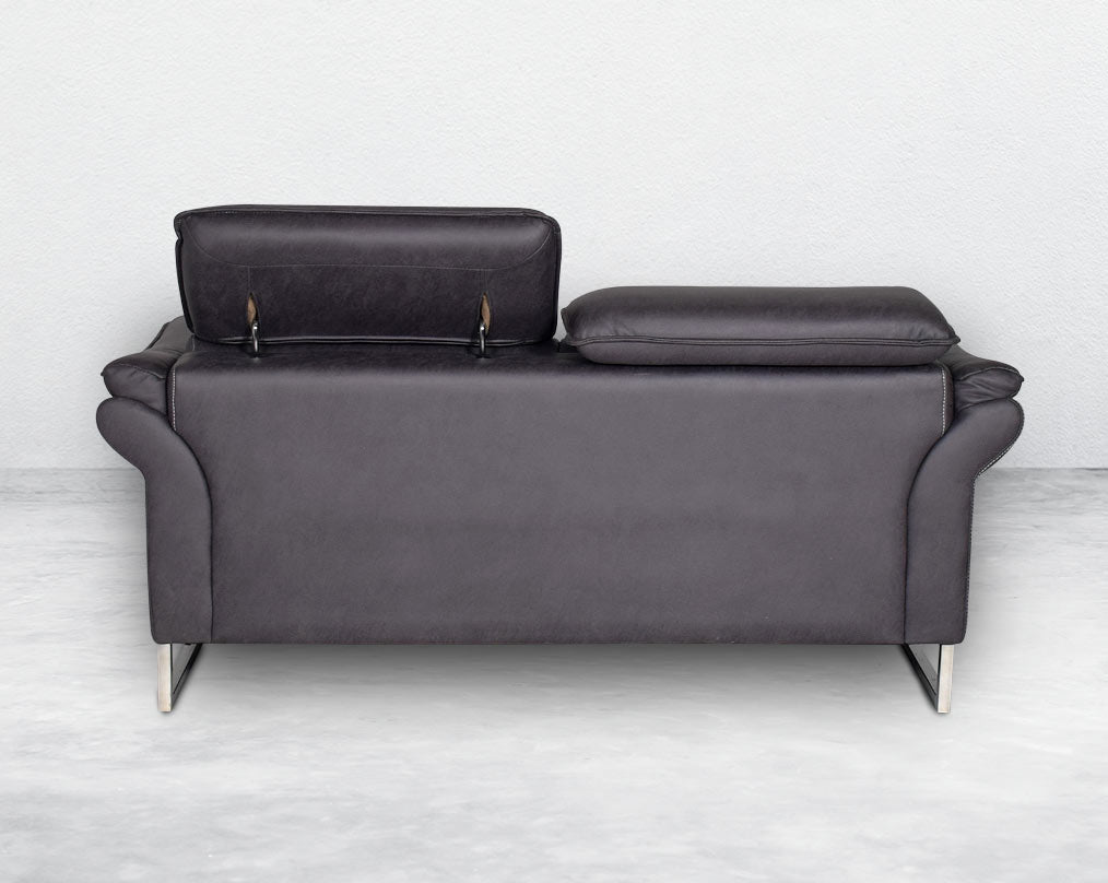 2 seater sofa set upholstered in fabric with adjustable headrest and stainless steel legs in sleek contemporary design.