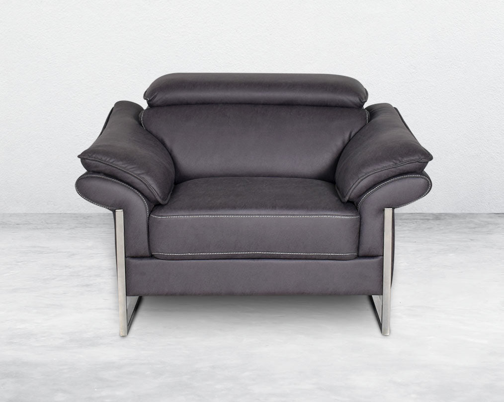 1 seater sofa set upholstered in fabric with adjustable headrest and stainless steel legs in sleek contemporary design.