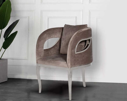 Leisure arm chair in fabric with stainless steel frame and legs.