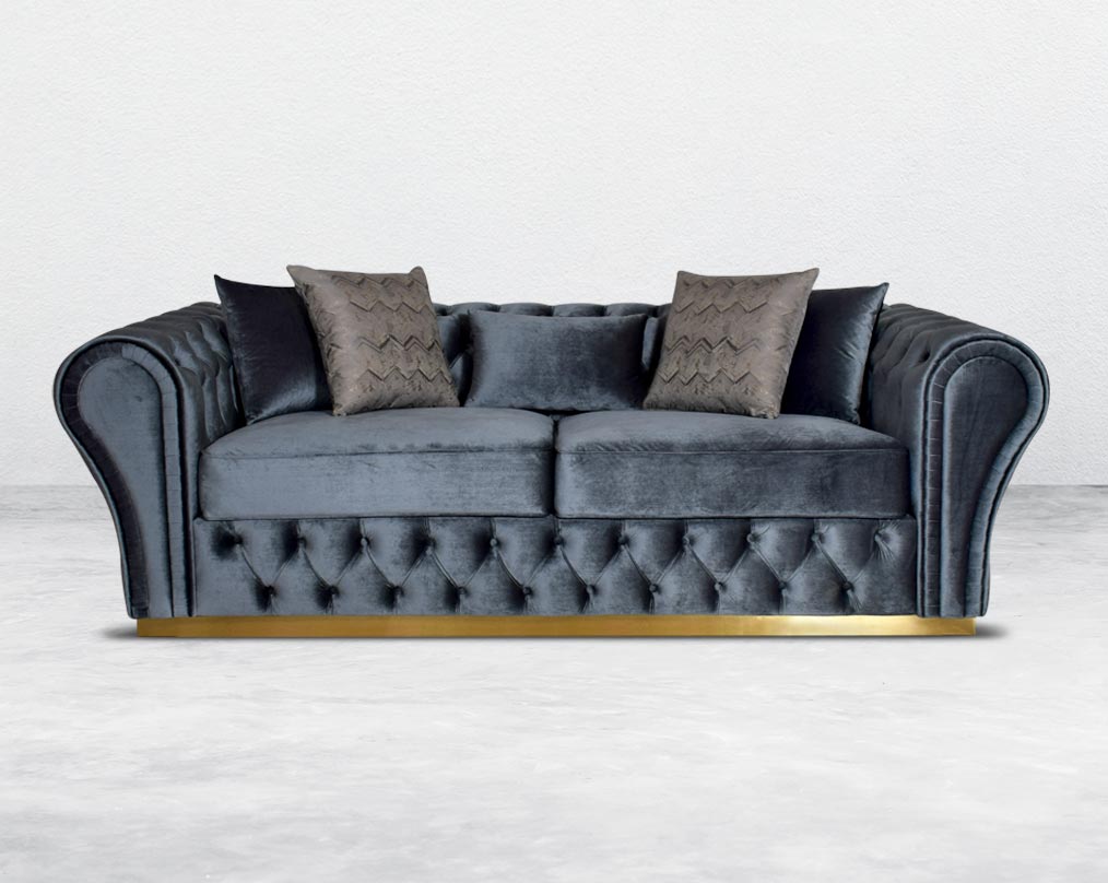 This 2 seater sofa set has a resplendent accentuated designer look and elegantly flared plush tufted armrests and backrest for an opulent style. The sofa is upholstered with high-quality velvet fabric and comes with 2 beautiful cushions to compliment