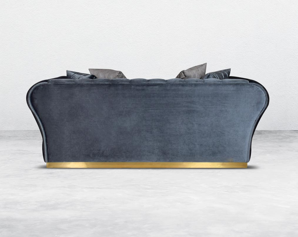 This 2 seater sofa set has a resplendent accentuated designer look and elegantly flared plush tufted armrests and backrest for an opulent style. The sofa is upholstered with high-quality velvet fabric and comes with 4 beautiful cushions to compliment