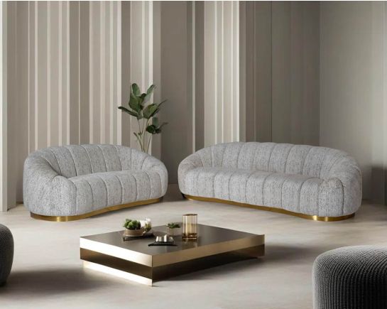 This 3+2 beautiful fabric sofa features vertical channel quilting with an outstanding design.