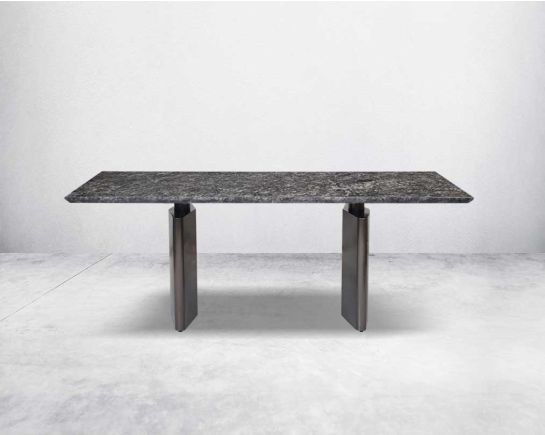 This 8-seater minimalistically designed dining table with grey marble top is an embodiment of contemporary chicness