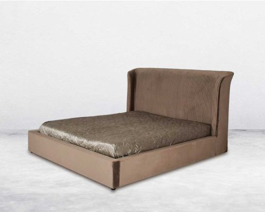 This elegant king-size bed comes with upholstered & quilted in fabric in a modern classic design side view