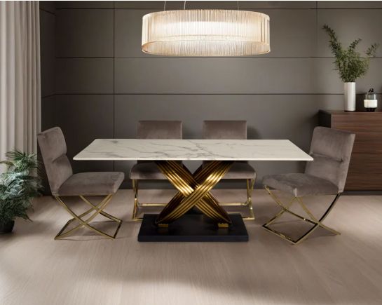 This voguish 6 seater rectangular dining table is cast with Dining chair upholstered in fabric with gold-plated stainless steel legs in a cross design with front view.