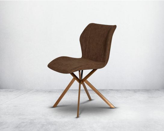 Dining chair upholstered in faux leather with high polished stainless steel legs plated in rose gold.