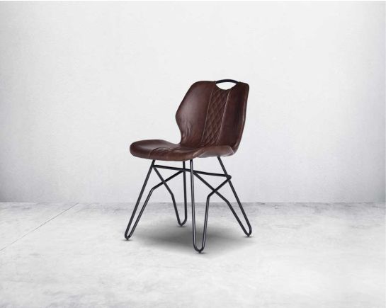 This soft, cushioned dining chair features an extraordinary contemporary design with tufted back and cushioned seat with metal legs side view