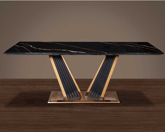 This glorious marble top dining table features a tree bark design motif finished in glossy rose gold plated stainless steel & black sandblasted base. It comfortably seats 8 people making an elegant & opulent style statement in any home.