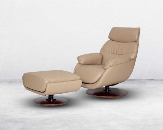 Rocking arm chair upholstered in faux leather with swivel and auto return adjustable locking mechanism. Rocking ottoman upholstered in faux leather with adjustable locking mechanism to compliment it.