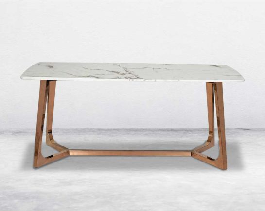 8 Seater rectangular dining table with white marble top and high polished stainless steel base with rose gold finish.