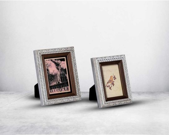 Photo frame in wood with stone embellished decorative frame in modern classic design. 1 large 2 small