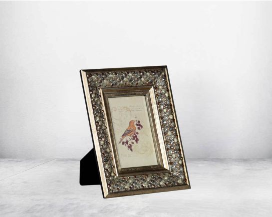 Photo frame in wood with stone embellished decorative frame in modern classic design.