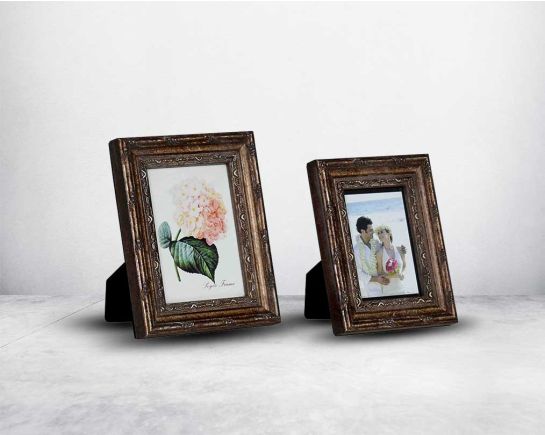 Photo frame in wood with decorative border in classic design. 1 large 2 small