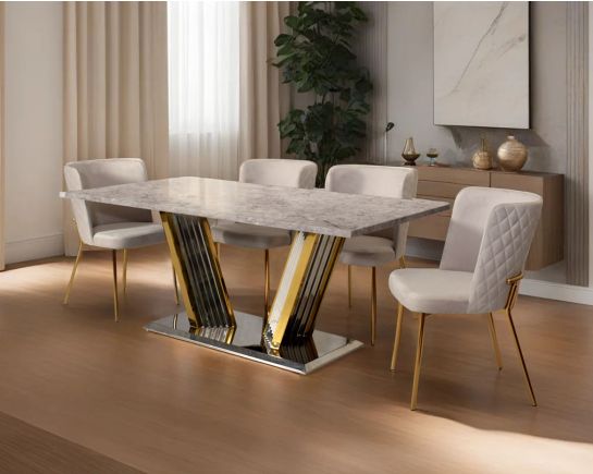 This glorious grey marble top dining table features a tree bark design motif and is crafted with a glossy gold-plated fluted stainless steel base. It makes for an opulent style statement to any home.

Minimalistically designed chair with criss-cross sti