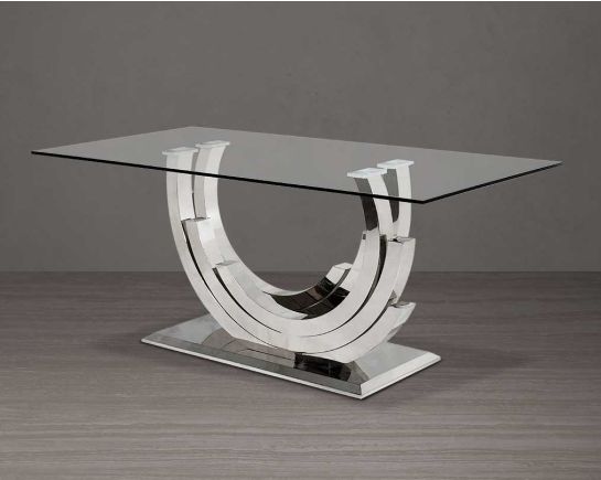 This 6 seater dining table with clear tempered glass top comes with an artful abstract stainless steel base The stainless steel base echoes an opulent and sophisticated modern style and stands out in any ambience.