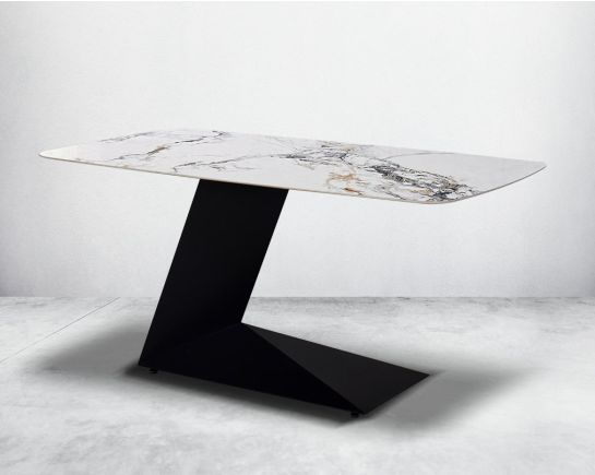 This 6-seater minimalist dining table is an embodiment of modern glamour. It is crafted with a faux marble top with a matt black metal base.