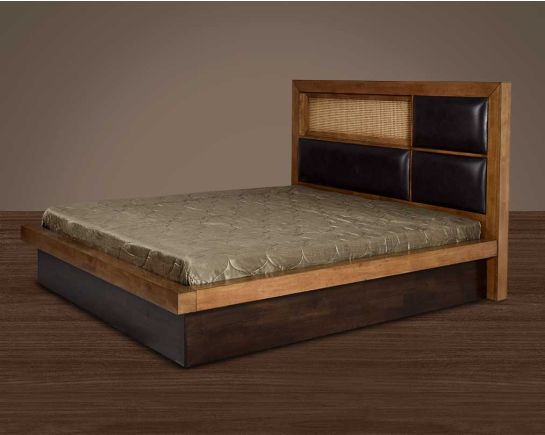 This luxurious king-size bed adds a natural & rustic opulent style to your space. It has a high headboard finished in antique oak upholstered in faux leather for added comfort. It also has a bamboo knitted shelf in the headboard & has a hydraulic style.