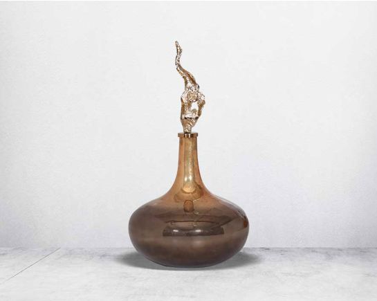 Decorative bottle in champagne & leopard bronze mercury lustre glass with ornamental antique gold plated aluminium lid.