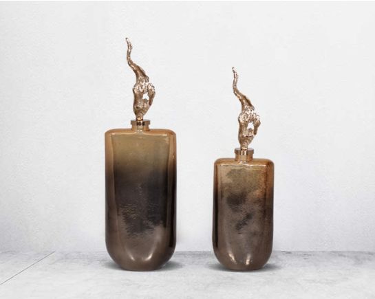 The modern decorative bottle features a champagne & leopard bronze mercury lustre glass with an ornamental antique gold plated aluminium lid. 1bottle large 2 bottle small