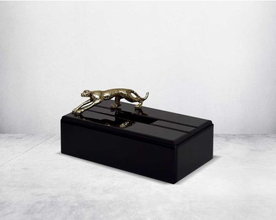 This modern & glam bathroom accessory designer set comprises a soap/lotion dispenser, a cotton jar, a tissue box & a tray in black glass with a gold leopard design motif making this set a perfect addition for a touch of allure to any bathroom.
