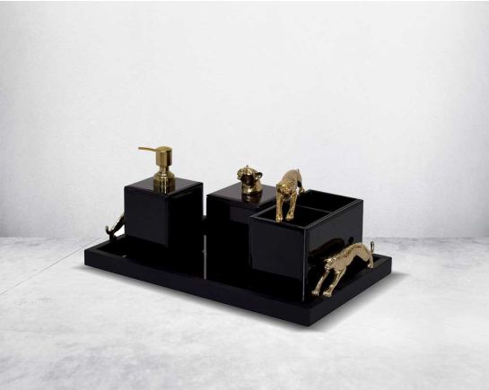 This modern & glam bathroom accessory designer set comprises a soap/lotion dispenser, a cotton jar, a tissue box & a tray in black glass with a gold leopard design motif making this set a perfect addition for a touch of allure to any bathroom.